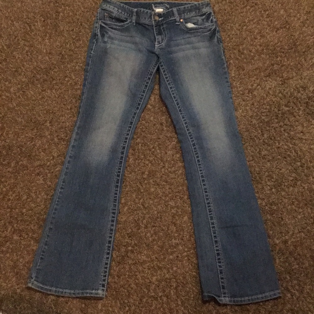 Boot cut light wash jeans:))